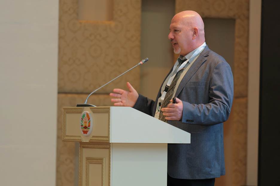 A person standing at a podium AI-generated content may be incorrect.